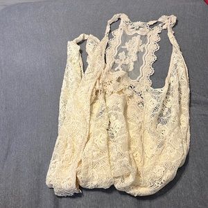 Long lace sleeveless shawl
